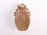 an image of a gold locke with a lizard on it