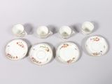 a set of six tea cups and saucers with floral designs