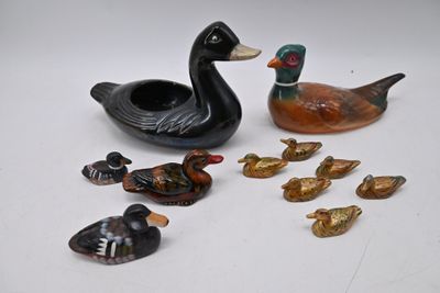a lot of ducks that are sitting on a table
