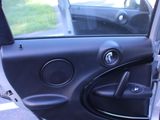 a car door open with the driver ' s side door open