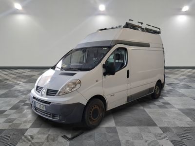 a white van that is parked on a checkered floor