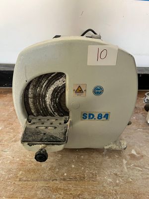 a machine that is sitting on a wooden floor