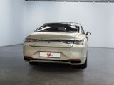 a car that is parked in a room with white walls