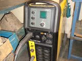an image of a welding machine in a garage