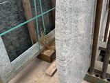 a large slab of granite sitting on a pallet