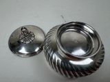 silver plated bowl with a lid and a lid with a bird on it