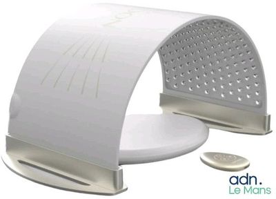 an image of a white toilet seat with a coin in front of it