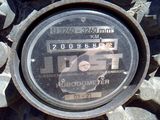 an image of a close up of a meter on a pile of tires