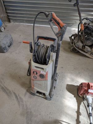 a machine that is sitting on the floor in the garage