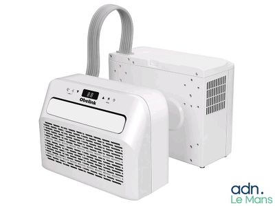 two white air conditioners sitting next to each other on a white surface