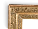 an image of a gold frame with a decorative pattern on it