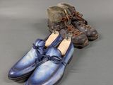 two pairs of blue shoes are sitting next to each other