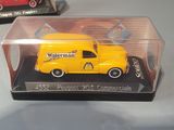 two toy cars in a clear box on a table