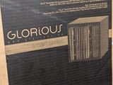 a box that is sitting on the floor in front of a wall