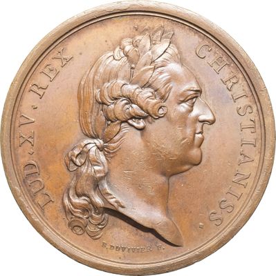 une image montrant un gros plan d'une pièce de monnaie à l'effigie d'une femme