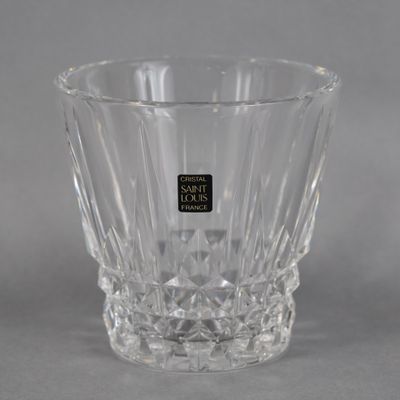 the glass is clear and has a black label on it