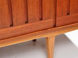 an image of a wooden cabinet with two doors