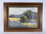 tableau représentant un champ de bluebonnets et un arbre solitaire, dans un cadre doré