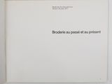 a white book with a black text on it
