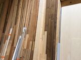 many pieces of wood stacked on top of each other