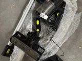a vacuum and a vacuum cleaner on the floor