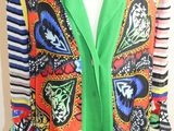 cardigan multicolore sur un mannequin, un mannequin, un mannequin, un mannequin, un mannequin, un mannequin, un mannequin, un mannequin