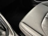 a close up of a car ' s interior with a gear box