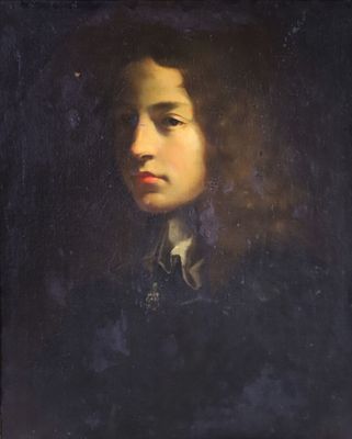 portrait d'un jeune homme en costume noir et cravate
