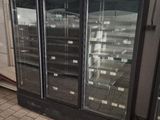 an image of a refrigerator in a store with its doors open