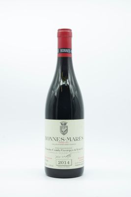 la bouteille de vin est posée sur une surface blanche