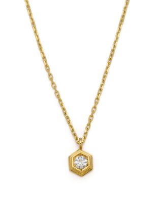 a gold necklace with a diamond pendant on a chain