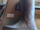 a box with a pair of rain boots on top of it