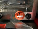 a sticker on the back of a toaster oven