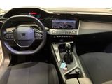 the interior of a car with a steering wheel, dashboard, and dashboard controls