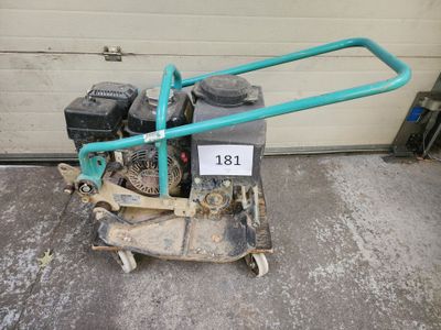 an image of a lawn mower with a handle on it