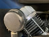 a close up of a motorcycle engine on a vehicle