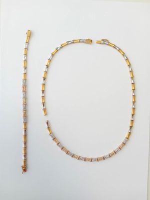 gold and white beaded necklace and bracelet set