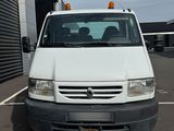 a picture of a white van parked in a parking lot