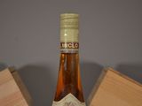 a bottle of alcohol that is sitting on a table
