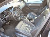 the interior of a car with a leather seat and dashboard