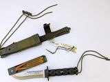 several different types of knives are laid out on a white surface