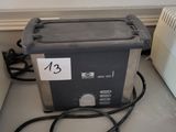 a toaster sitting on a counter next to a heater