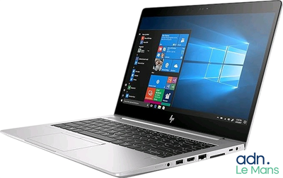 laptop with windows on the screen and windows logo on the screen