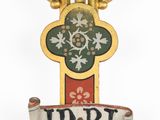 a sign that says irri on it with a cross on it