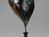 a large horn shaped object on top of a table