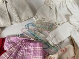 a pile of clothes and a pair of scissors on a table
