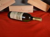 a bottle of wine that is sitting on a table
