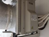 an air conditioner that is attached to a wall