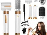 an image of a woman is holding a hair dryer and comb