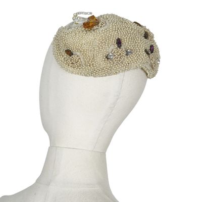 cream beaded headpiece with multi colored stones and pearls